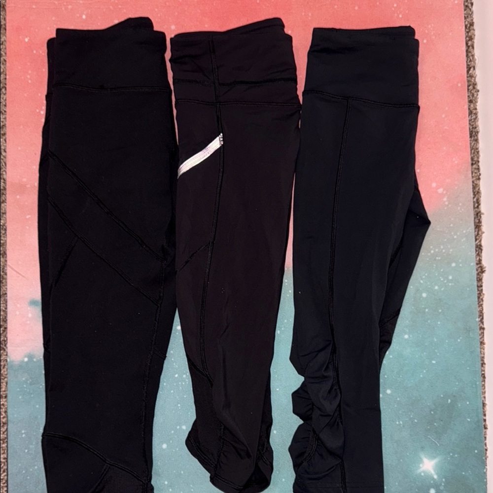 Lot of 3 lululemon capri Black Leggings size 2 and 4